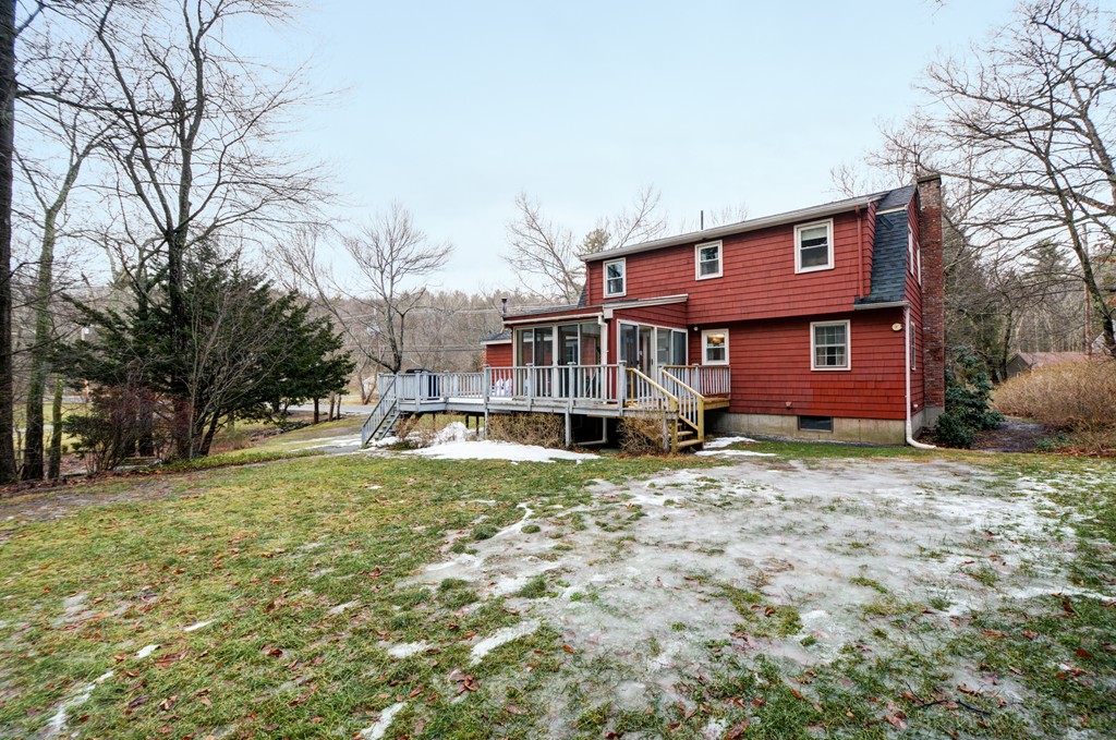 86 Harvard Road Stow, MA 01775 - Photo 19 of 19 a view of a house with a yard