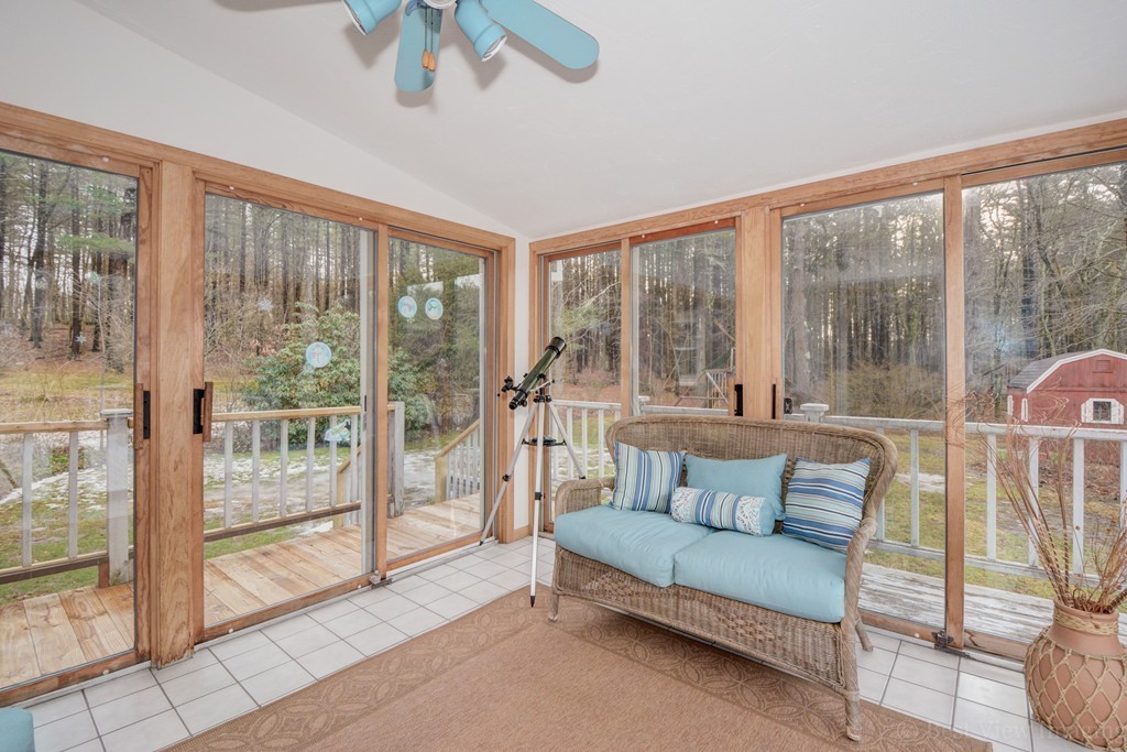 86 Harvard Road Stow, MA 01775 - Photo 4 of 19 a living room with furniture and a large window