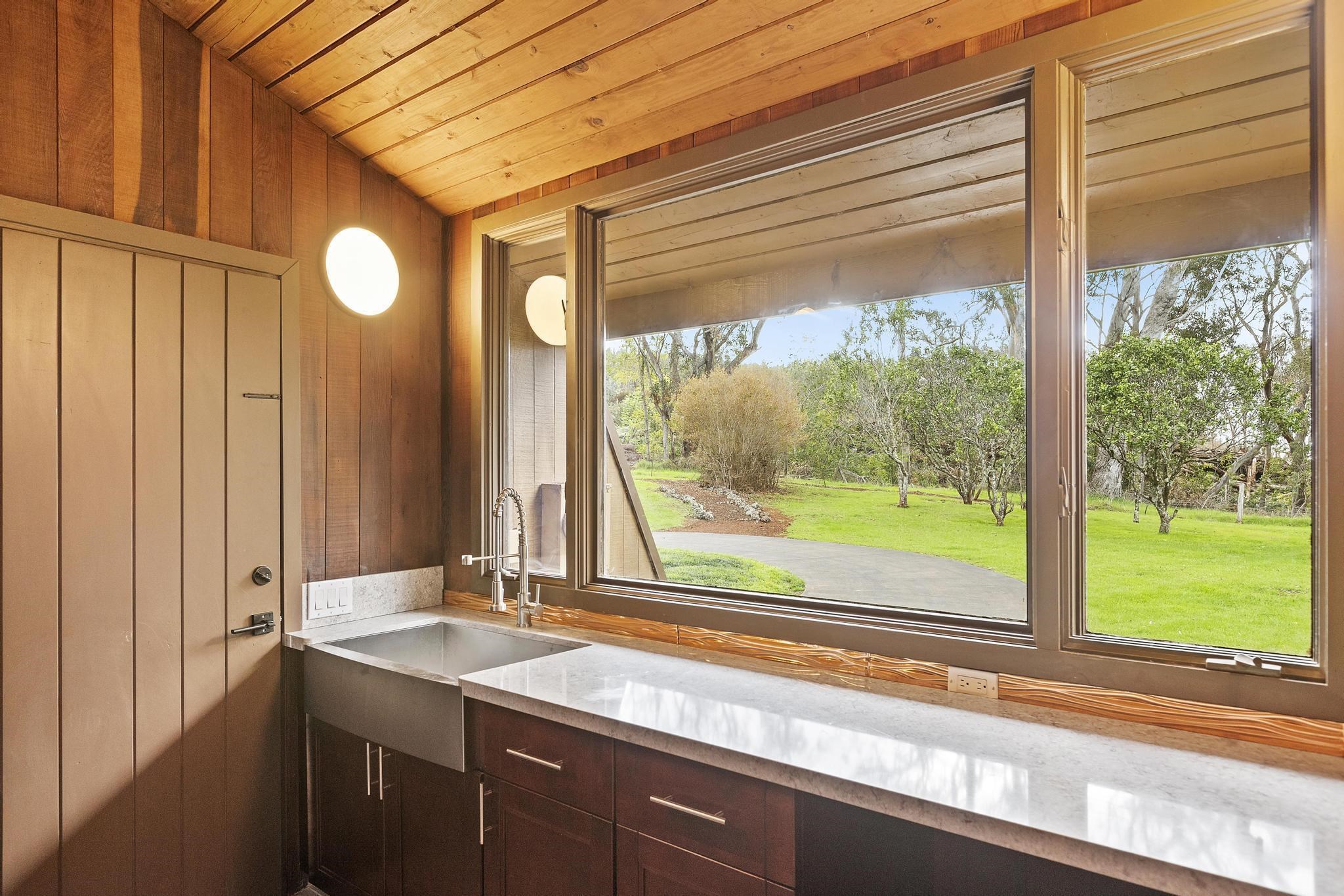2450 Piiholo Road Makawao, HI 96768 - Photo 13 of 39 a view of a sink and a large window