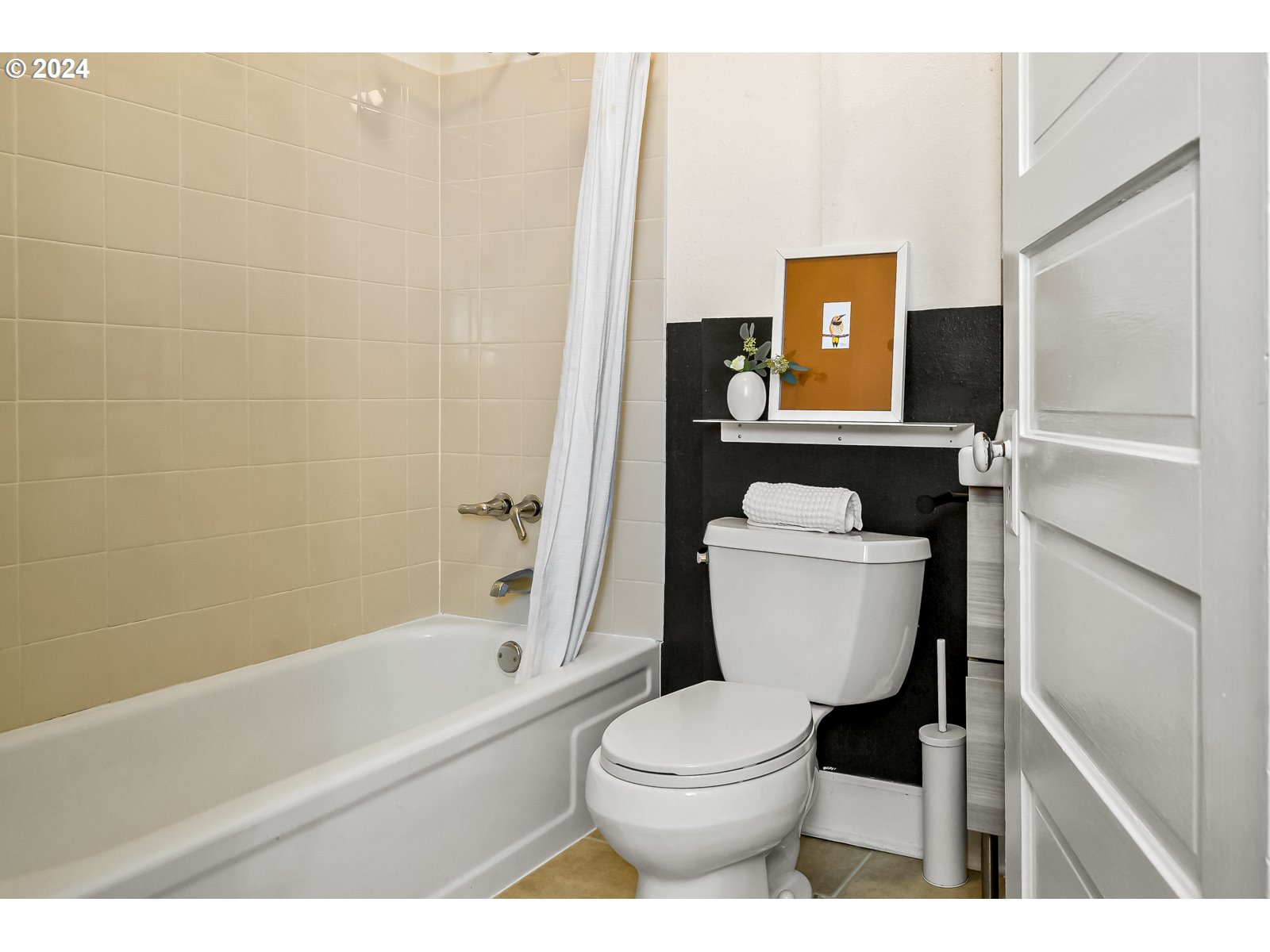 1518 North Webster Street Portland, OR 97217 - Photo 21 of 38 a bathroom with a toilet and a shower