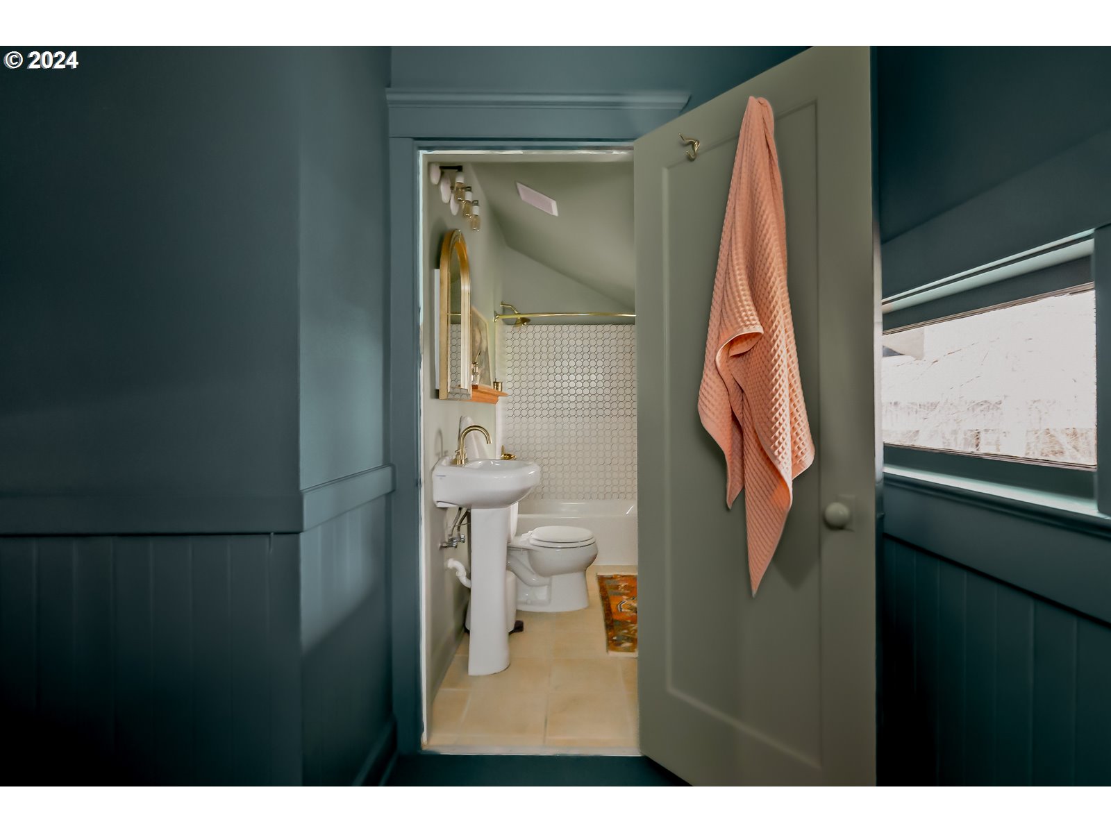 1518 North Webster Street Portland, OR 97217 - Photo 23 of 38 a bathroom with a toilet and a shower curtain