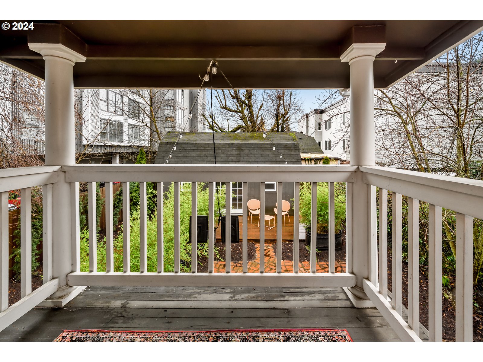 1518 North Webster Street Portland, OR 97217 - Photo 25 of 38 a view of a porch with a table in the porch