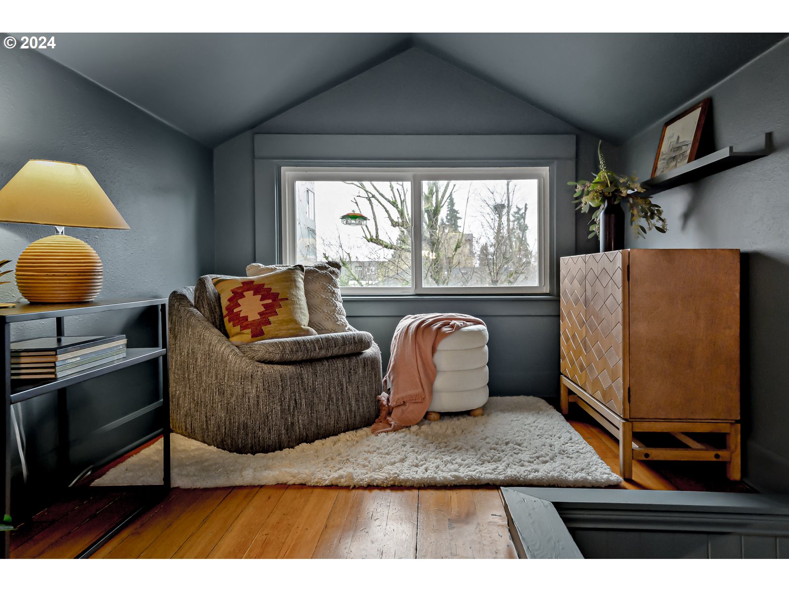 1518 North Webster Street Portland, OR 97217 - Photo 26 of 38 a living room with furniture and a flat screen tv
