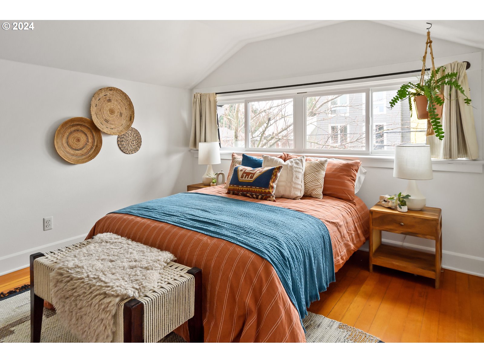 1518 North Webster Street Portland, OR 97217 - Photo 28 of 38 a bedroom with a bed and a window
