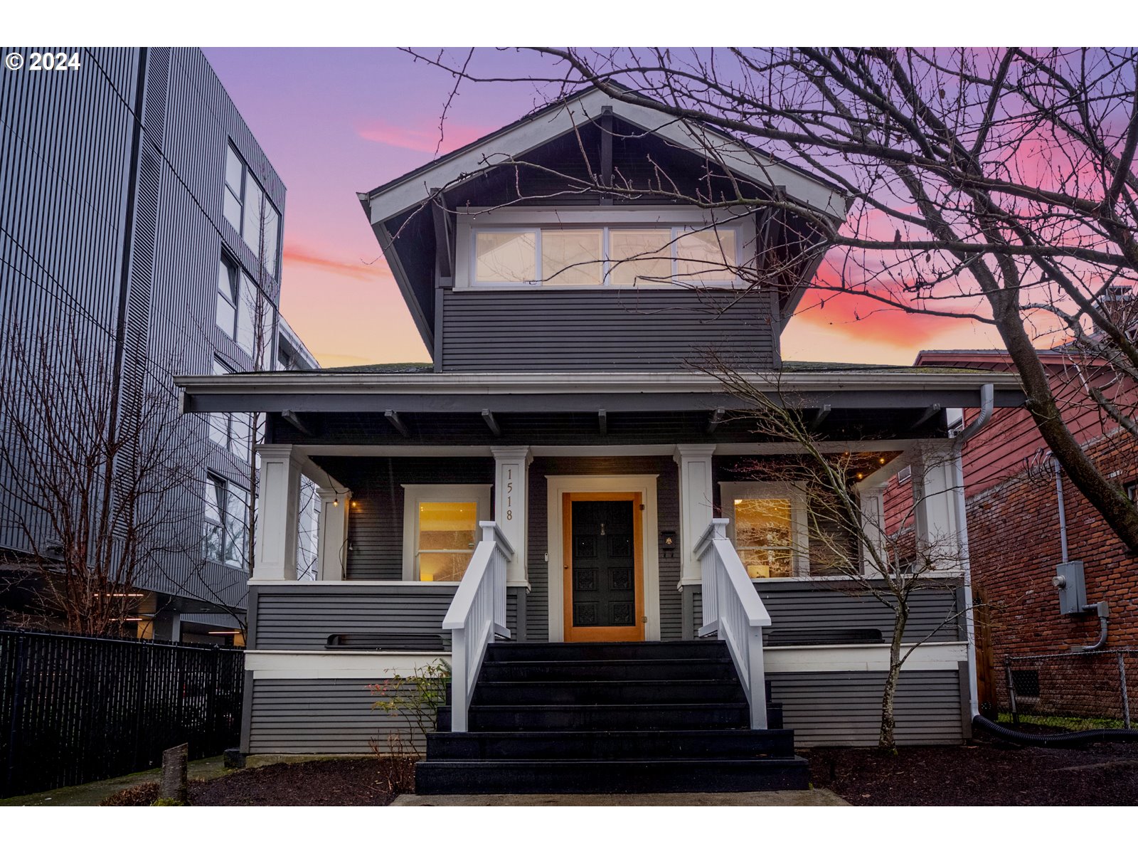 1518 North Webster Street Portland, OR 97217 - Photo 38 of 38 a view of a wooden house with large windows and a table