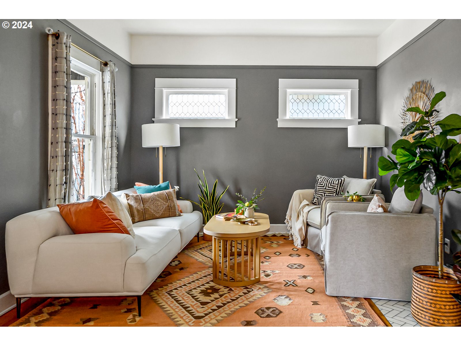 1518 North Webster Street Portland, OR 97217 - Photo 5 of 38 a living room with furniture and a potted plant