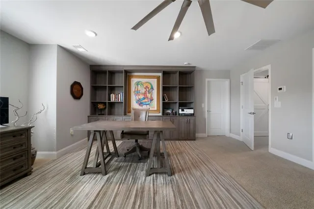 a view of kitchen and windows