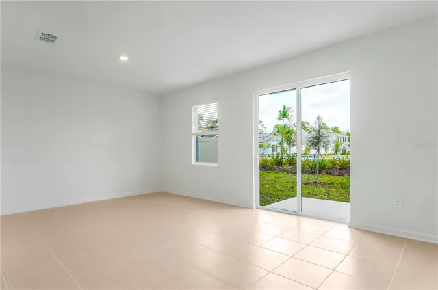 a view of a kitchen with a sink and an oven