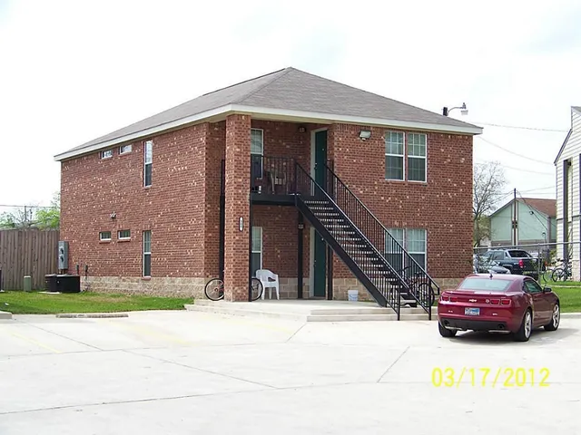 a front view of a house with yard