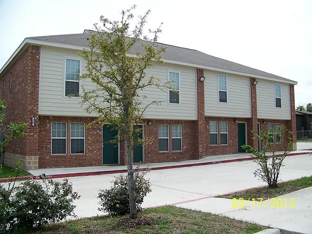 a view of a house with a patio