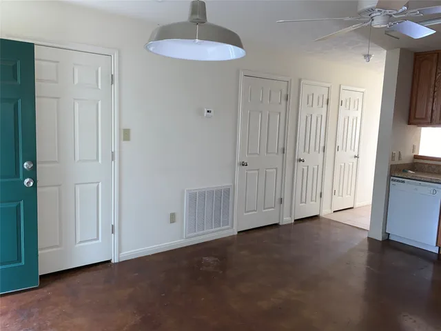 a kitchen with stainless steel appliances a refrigerator and a sink