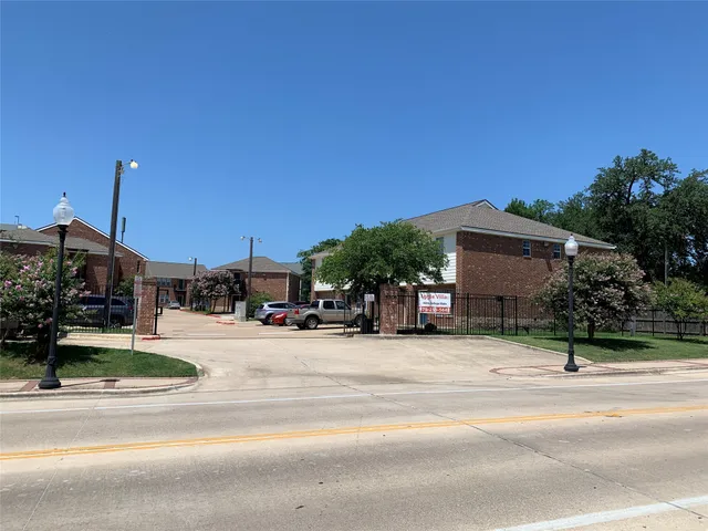 a car parked in front of a house