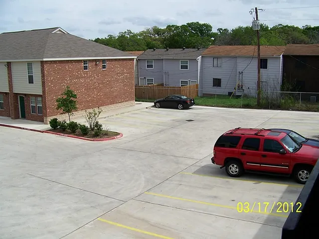 a front view of a house with trees