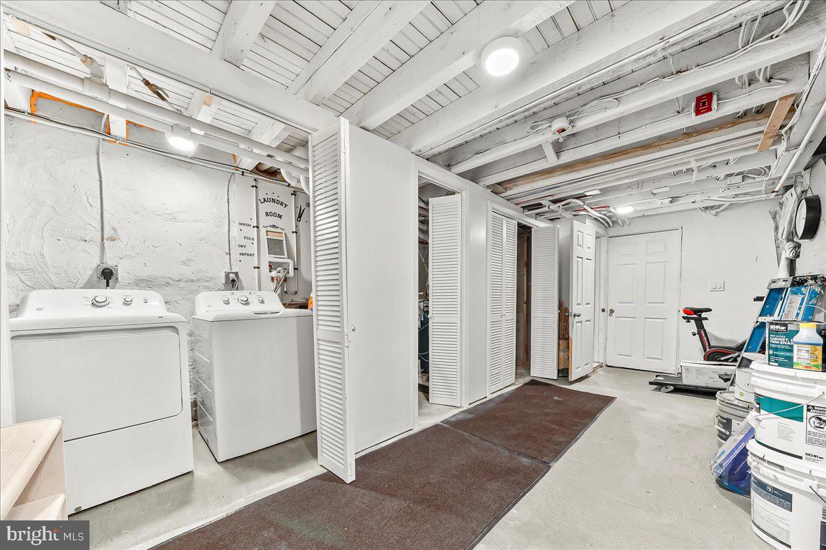 5348 West Berks Street Philadelphia, PA 19131 - Photo 15 of 18 a spacious bathroom with a double vanity sink and a mirror