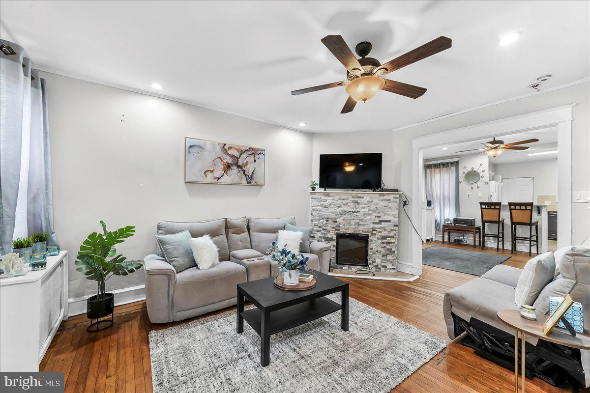 5348 West Berks Street Philadelphia, PA 19131 - Photo 3 of 18 a living room with furniture fireplace and a window