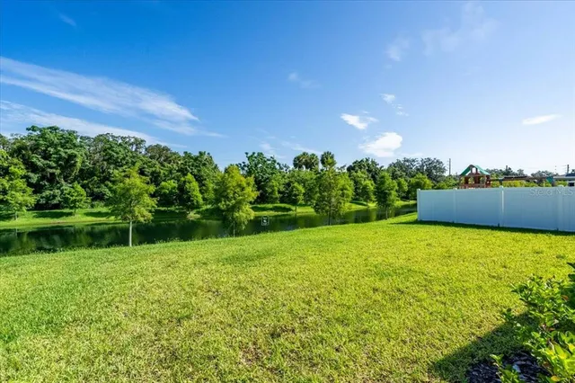 a view of a garden with a lake