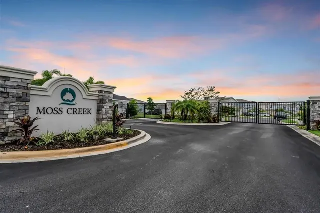 a view of a street with a building in the background