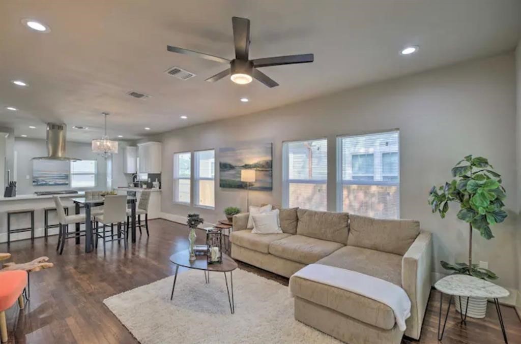 5224 Leeland Street Houston, TX 77023 - Photo 4 of 18 a living room with furniture and a large window