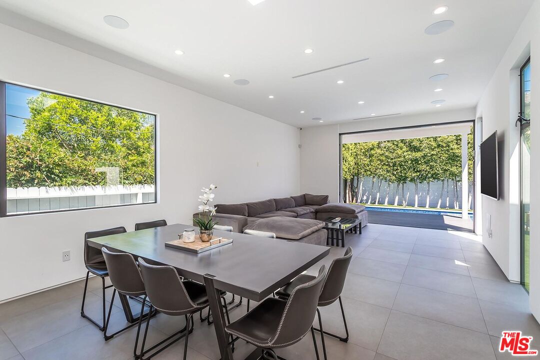 1948 South Point View Street Los Angeles, CA 90034 - Photo 12 of 27 a view of a dining room with furniture window and outside view