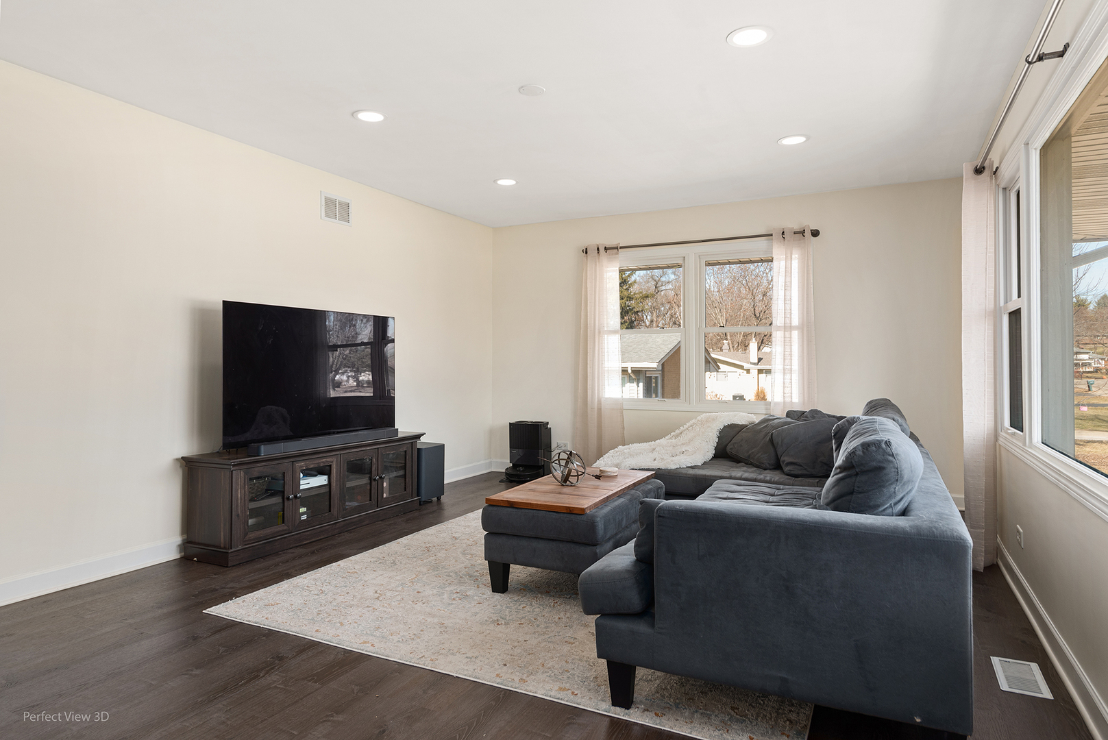 11N958 Almora Terrace Elgin, IL 60124 - Photo 2 of 26 a living room with furniture and a flat screen tv