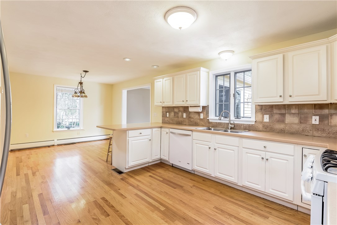 185 Wickham Road North Kingstown, RI 02852 - Photo 11 of 38 Gleaming hardwoods...updated appliances...Corian counter-tops!