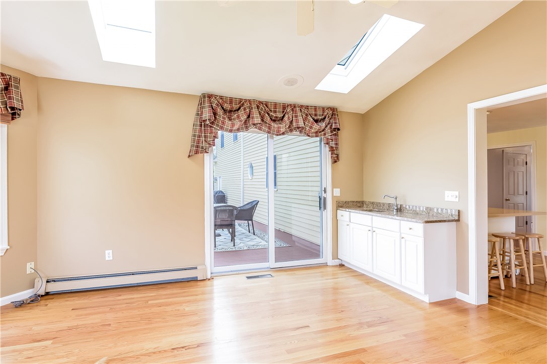 185 Wickham Road North Kingstown, RI 02852 - Photo 18 of 38 sliding glass doors leading to a backyard paradise!