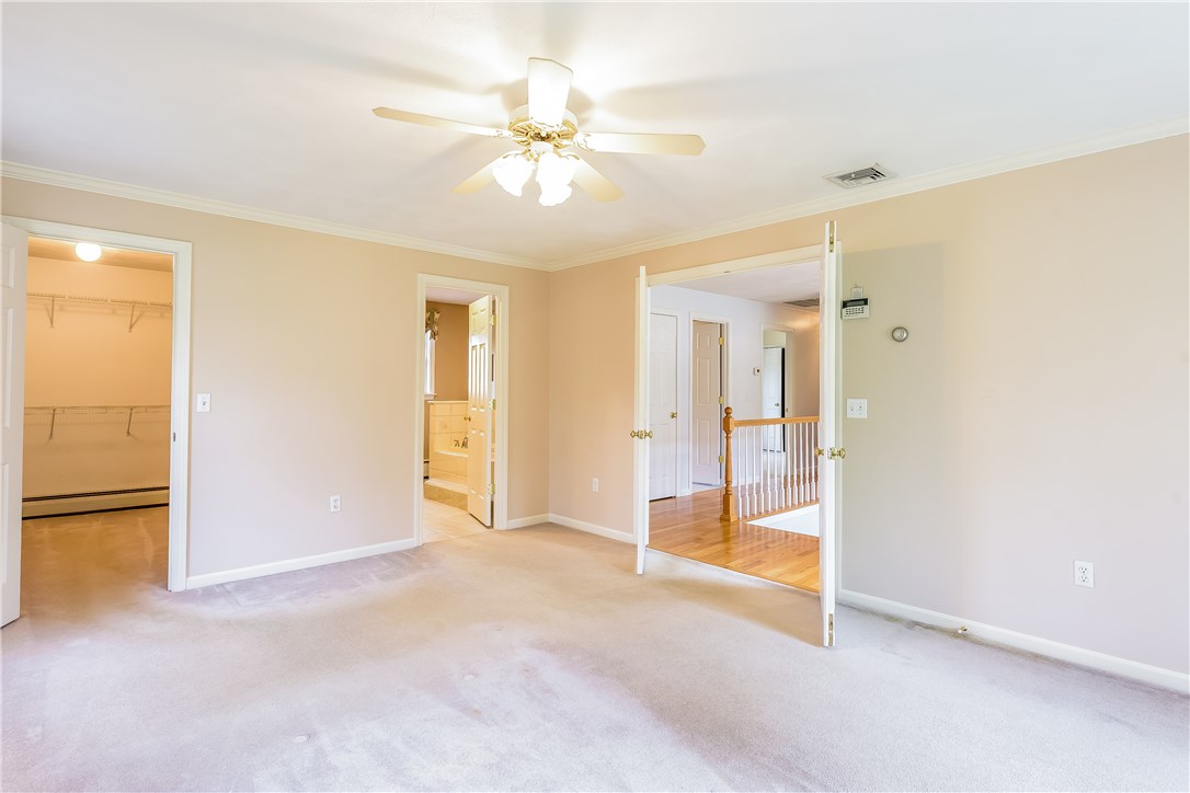 185 Wickham Road North Kingstown, RI 02852 - Photo 21 of 38 Master bedroom with french doors, walk in closet and en-suite!