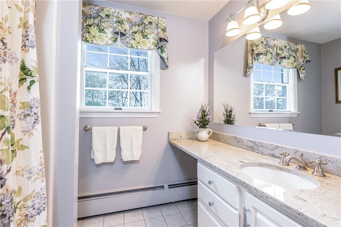 185 Wickham Road North Kingstown, RI 02852 - Photo 25 of 38 Guest bath with tub shower and vanity with granite top!