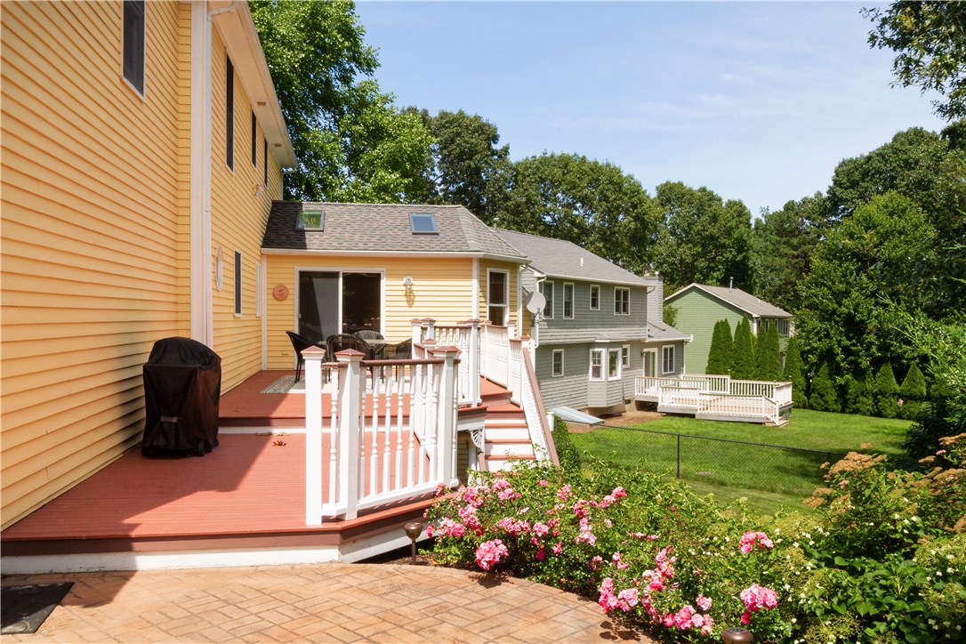 185 Wickham Road North Kingstown, RI 02852 - Photo 30 of 38 Expansive deck with side yard patio!