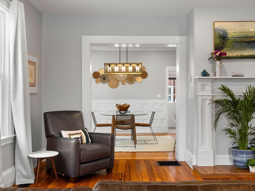 299 Central Avenue Dedham, MA 02026 - Photo 12 of 39 a living room with furniture and a flat screen tv