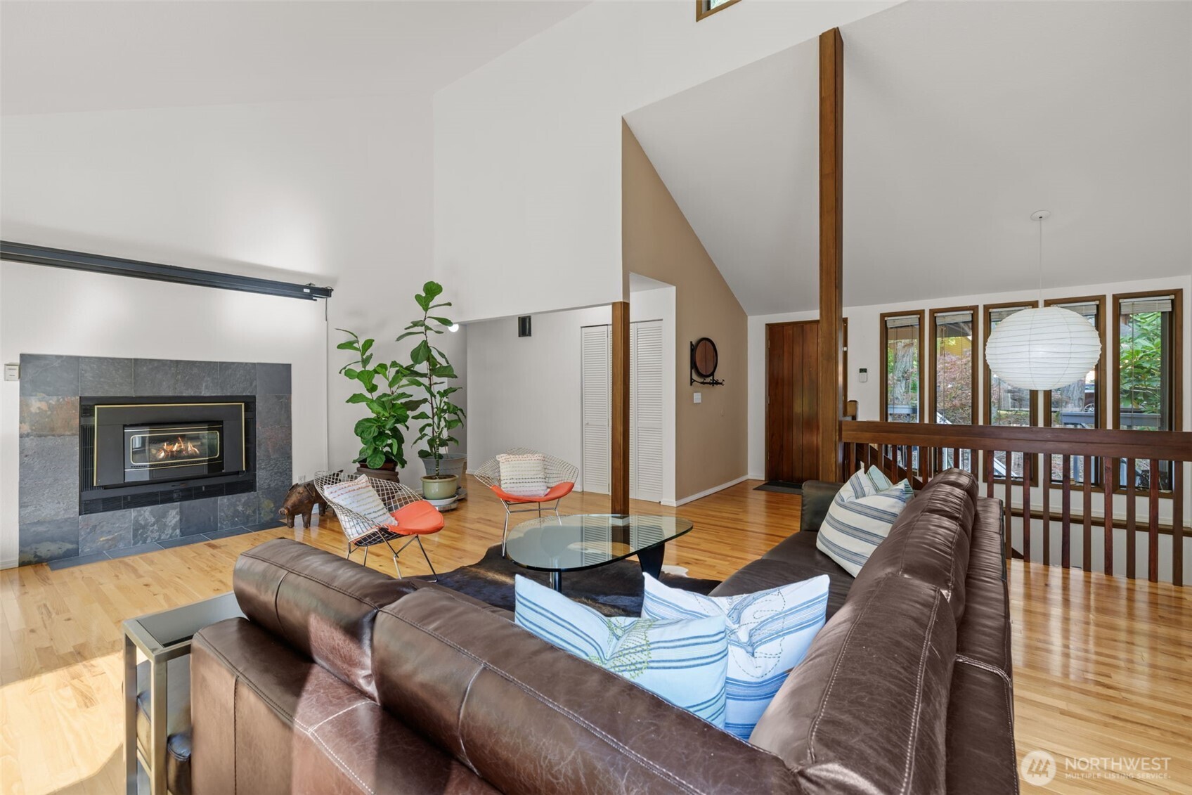 4714 175th Street Southeast Bothell, WA 98012 - Photo 12 of 40 a living room with furniture and a fireplace