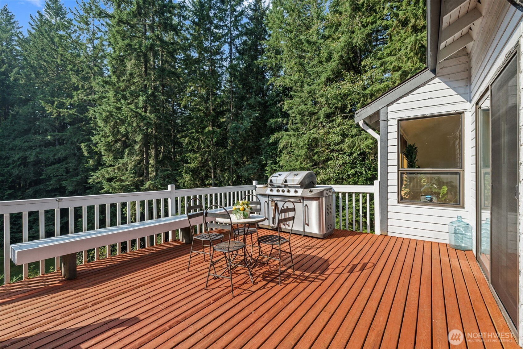 4714 175th Street Southeast Bothell, WA 98012 - Photo 22 of 40 a view of a chairs on wooden deck