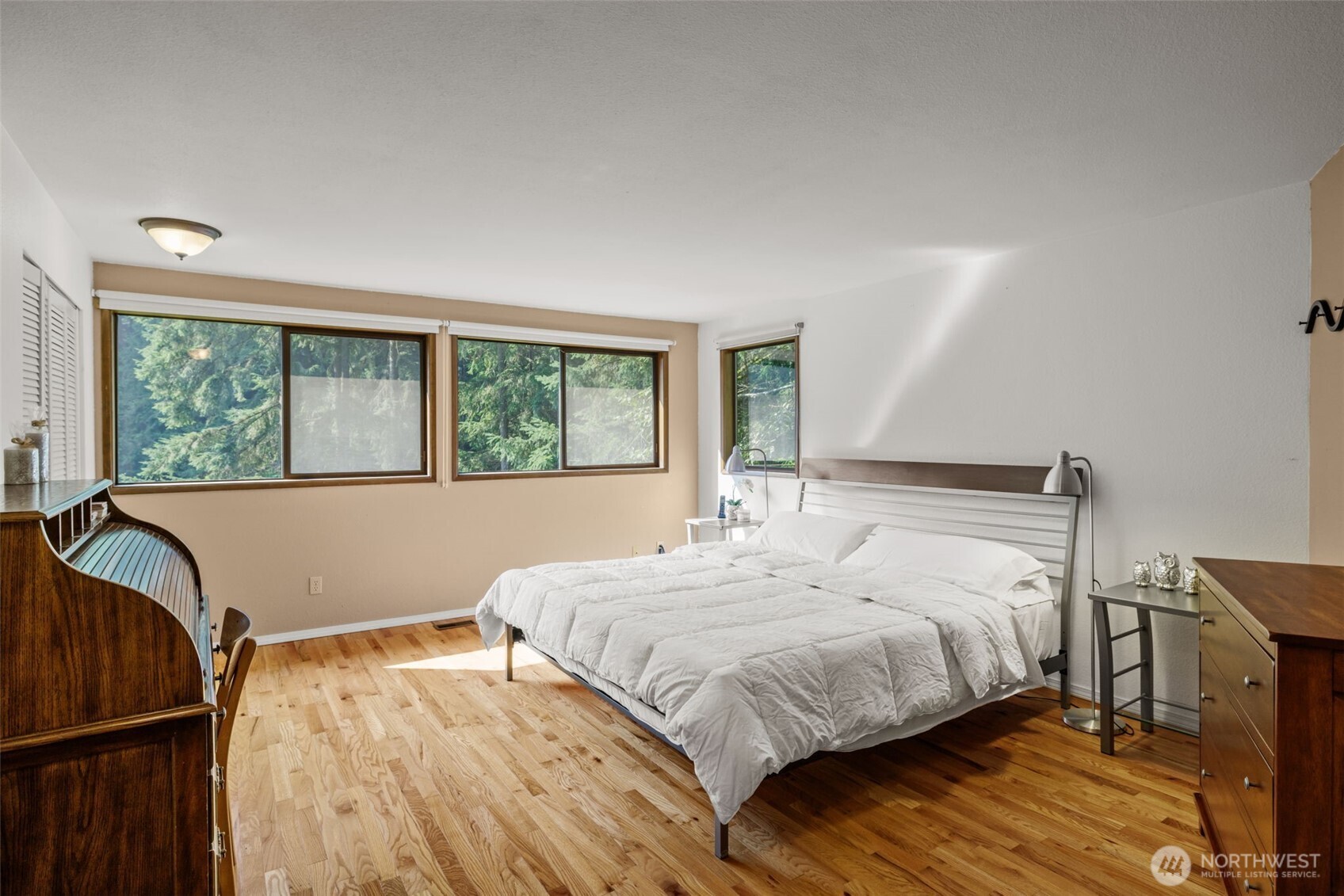4714 175th Street Southeast Bothell, WA 98012 - Photo 25 of 40 a bedroom with a bed and a window