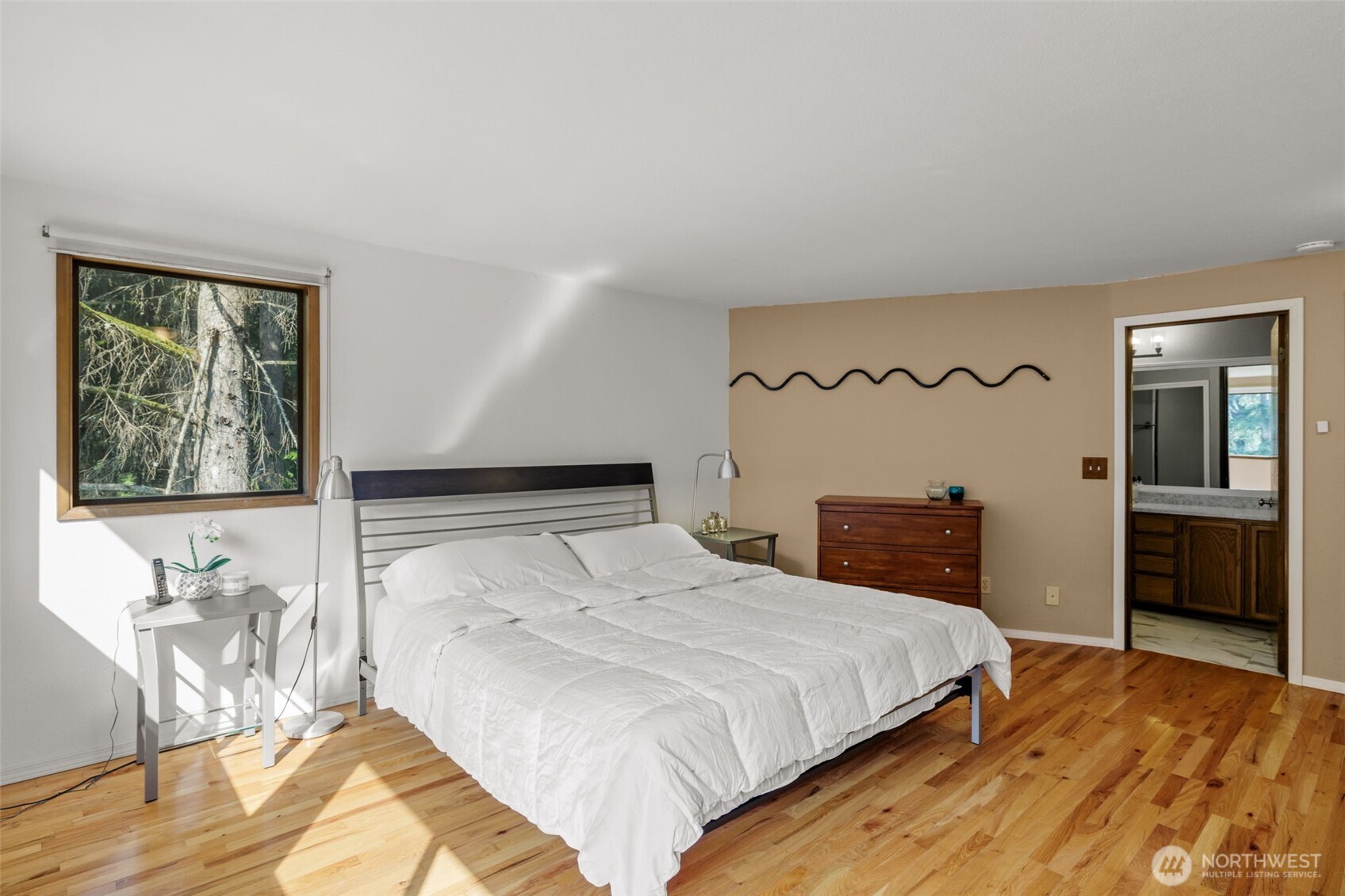 4714 175th Street Southeast Bothell, WA 98012 - Photo 26 of 40 a bedroom with a bed and a window