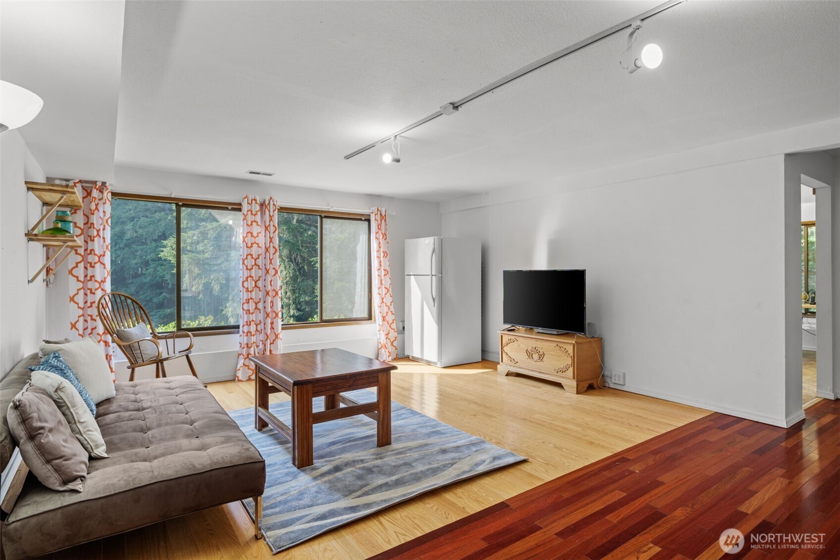4714 175th Street Southeast Bothell, WA 98012 - Photo 31 of 40 a living room with furniture and a flat screen tv