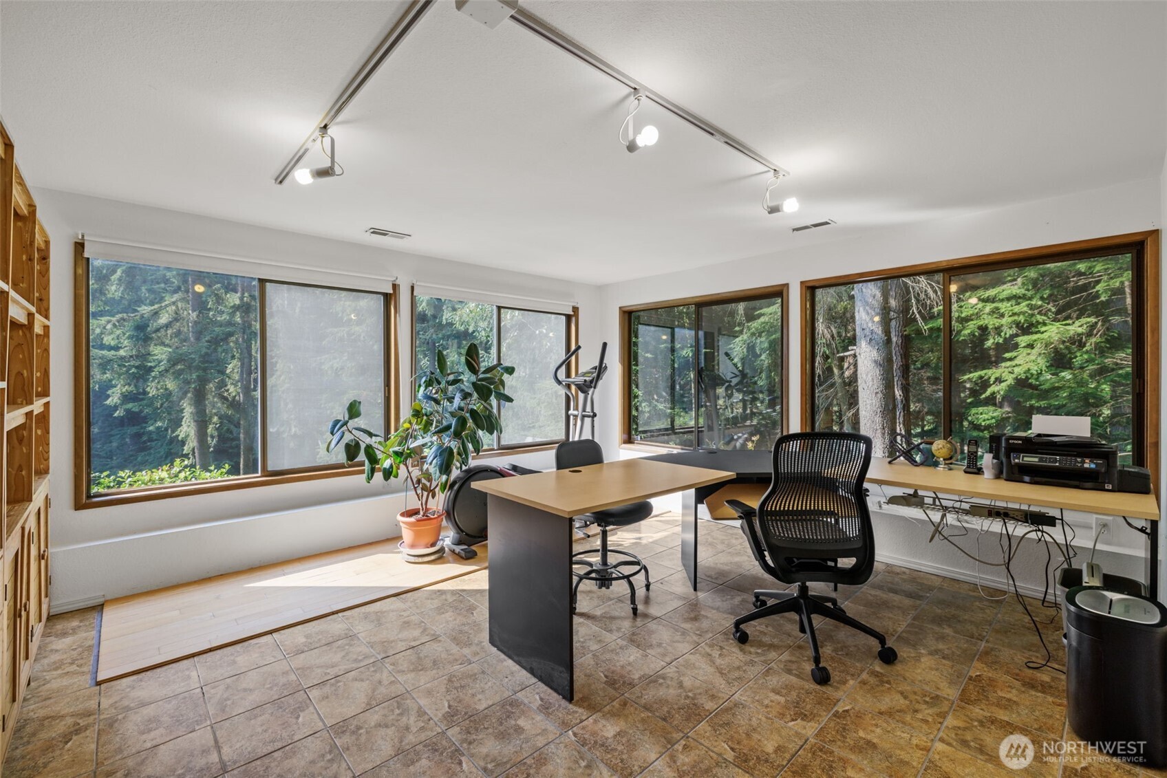 4714 175th Street Southeast Bothell, WA 98012 - Photo 34 of 40 a view of a workspace with furniture and a window
