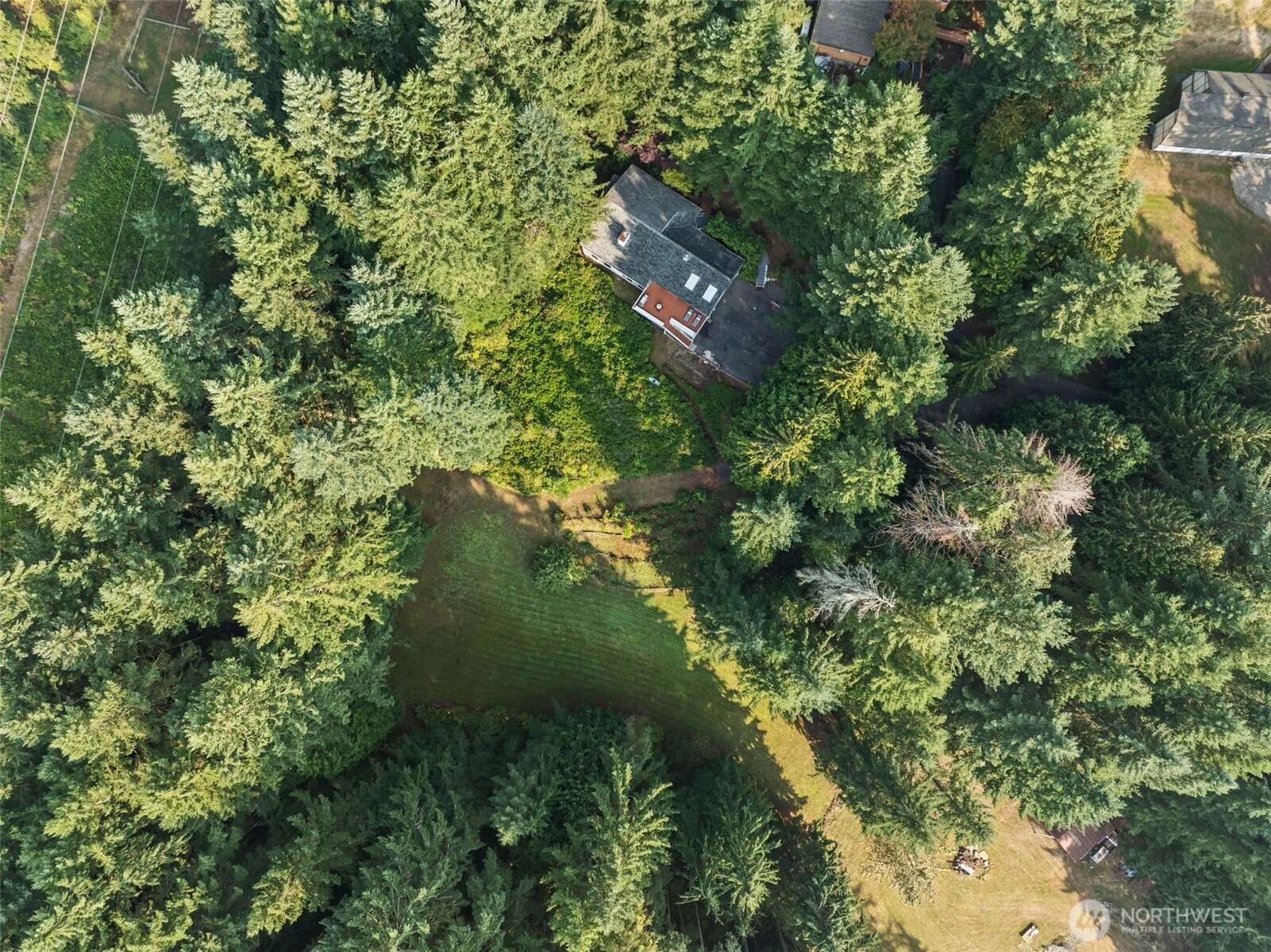4714 175th Street Southeast Bothell, WA 98012 - Photo 39 of 40 an aerial view of residential houses with outdoor space and trees