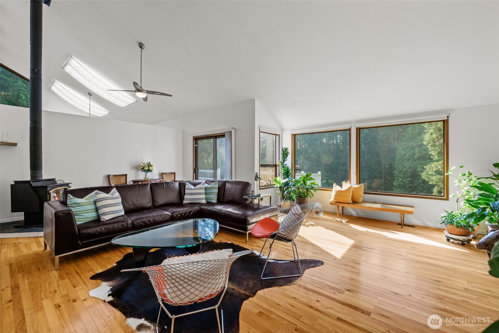 4714 175th Street Southeast Bothell, WA 98012 - Photo 9 of 40 a living room with furniture and a large window