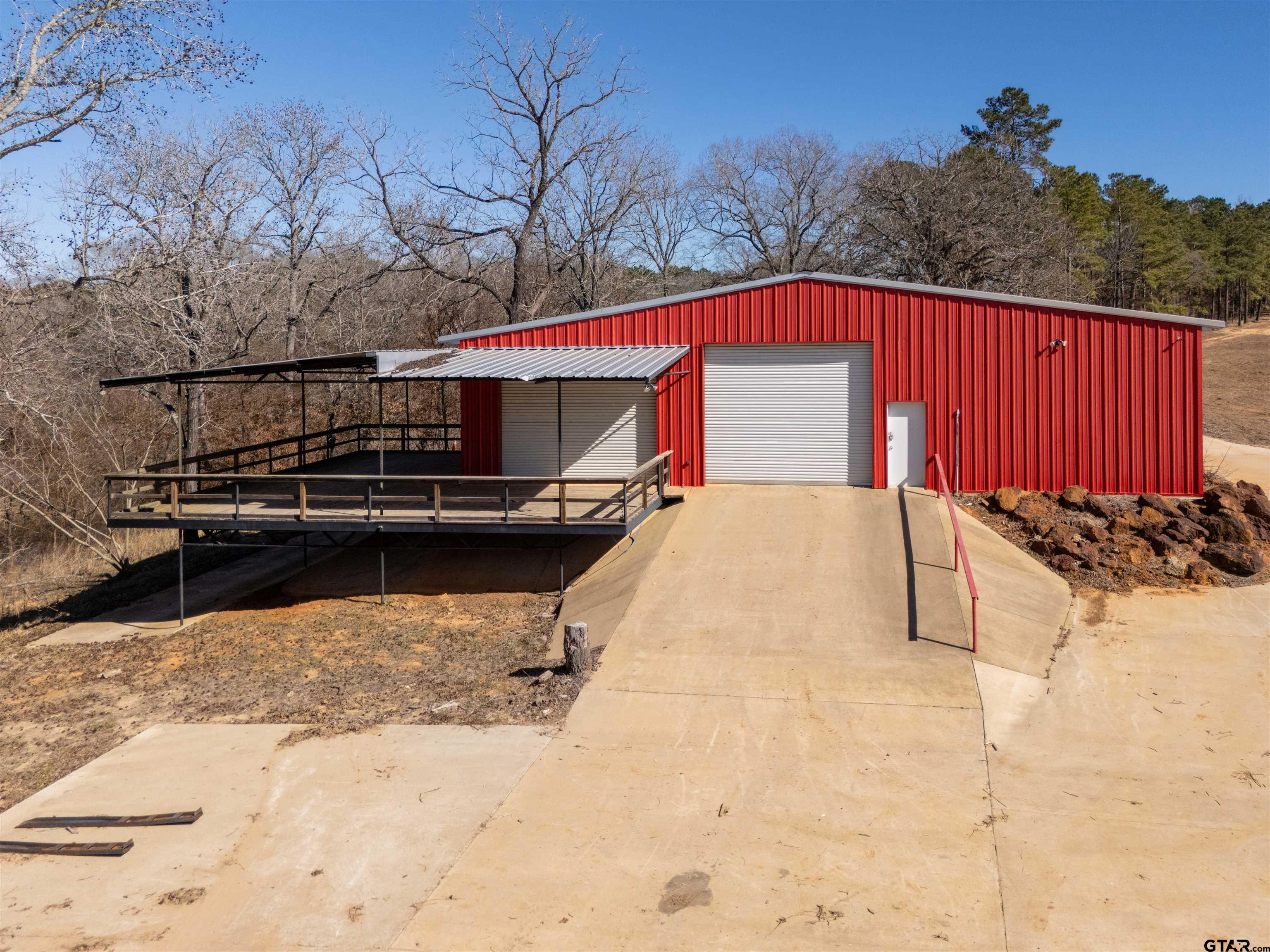 10490 Us Highway Cuney, TX 75759 - Photo 15 of 36 a view of a roof deck with wooden fence and floor