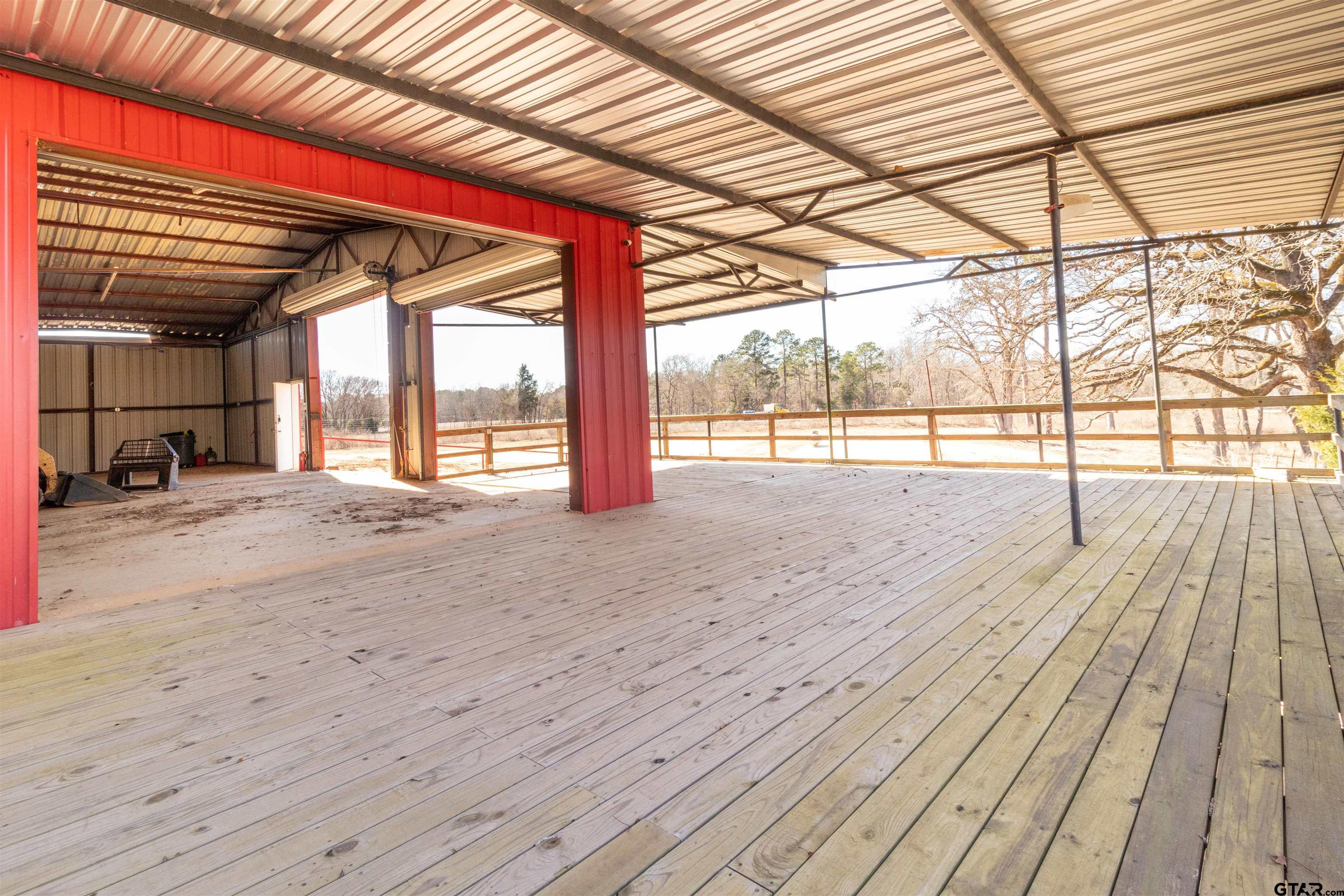 10490 Us Highway Cuney, TX 75759 - Photo 26 of 36 a view of an empty room with wooden floor and a window