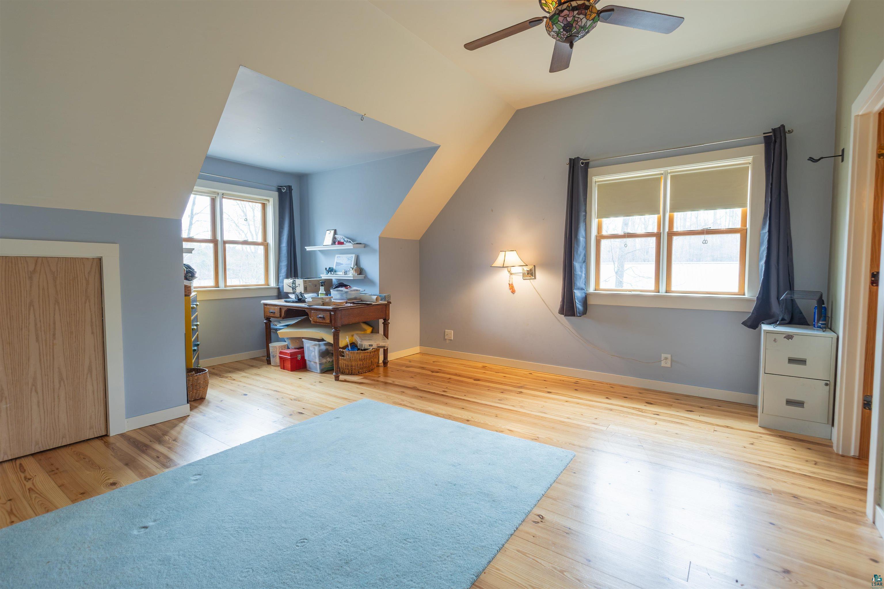 20210 Siskiwit Lake Road Cornucopia, WI 54827 - Photo 23 of 40 Gorgeous pine floors, ten ft ceilings,