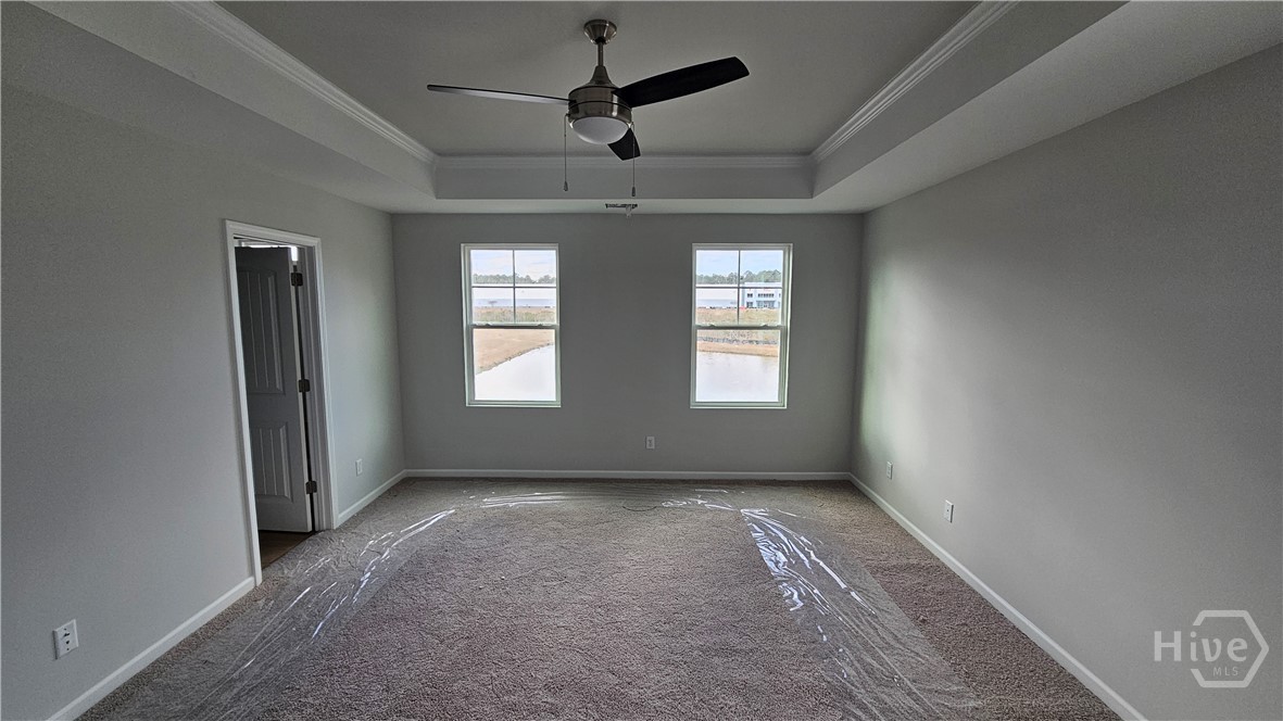 216 Hasty Point Road Rincon, GA 31326 - Photo 5 of 30 Primary Bedroom with Tray Ceiling and Fan