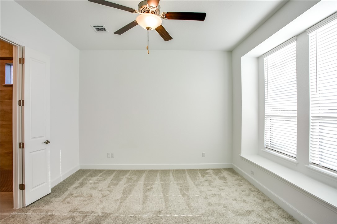 505 Affazia Lane Georgetown, TX 78628 - Photo 18 of 32 a view of an empty room with a window
