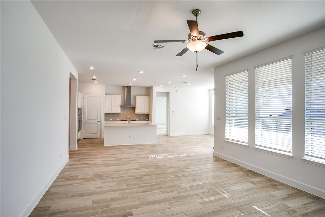 505 Affazia Lane Georgetown, TX 78628 - Photo 8 of 32 a view of a kitchen with a sink and a window