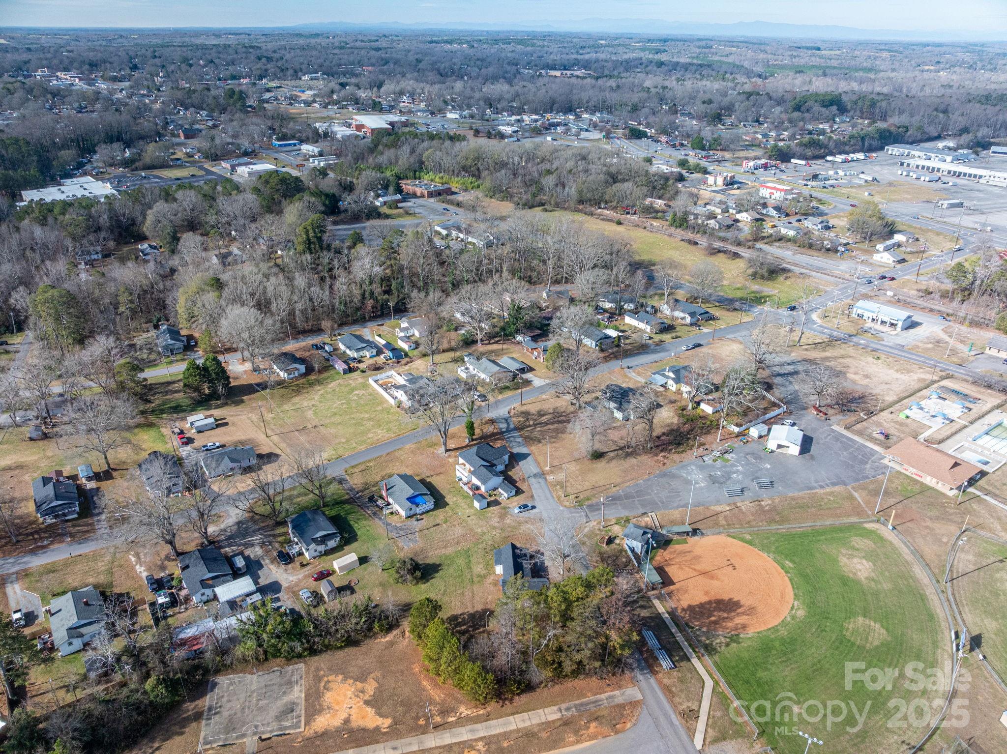 102 Guffey Road Cherryville, NC 28021 - Photo 14 of 15 an aerial view of residential houses with outdoor space