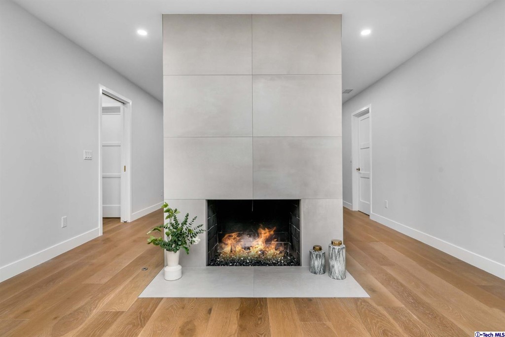 3840 Mayfair Drive Pasadena, CA 91107 - Photo 11 of 43 a living room with furniture and a fireplace