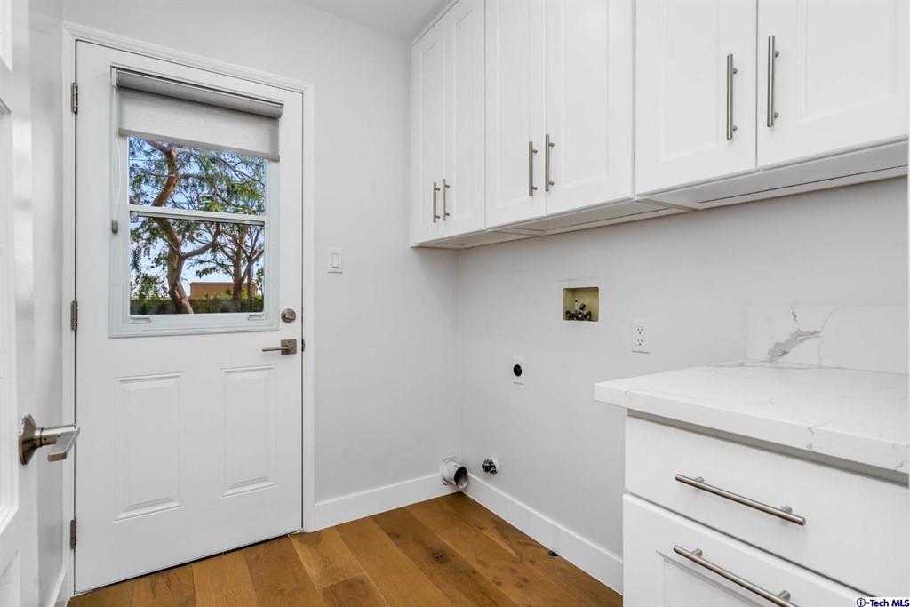 3840 Mayfair Drive Pasadena, CA 91107 - Photo 33 of 43 a bathroom with a sink and cabinets