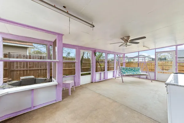 a view of an empty room and window
