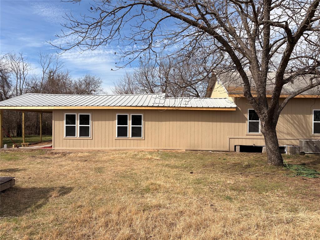 616 Breckenridge Highway Ranger, TX 76470 - Photo 6 of 16 a view of a house with a yard