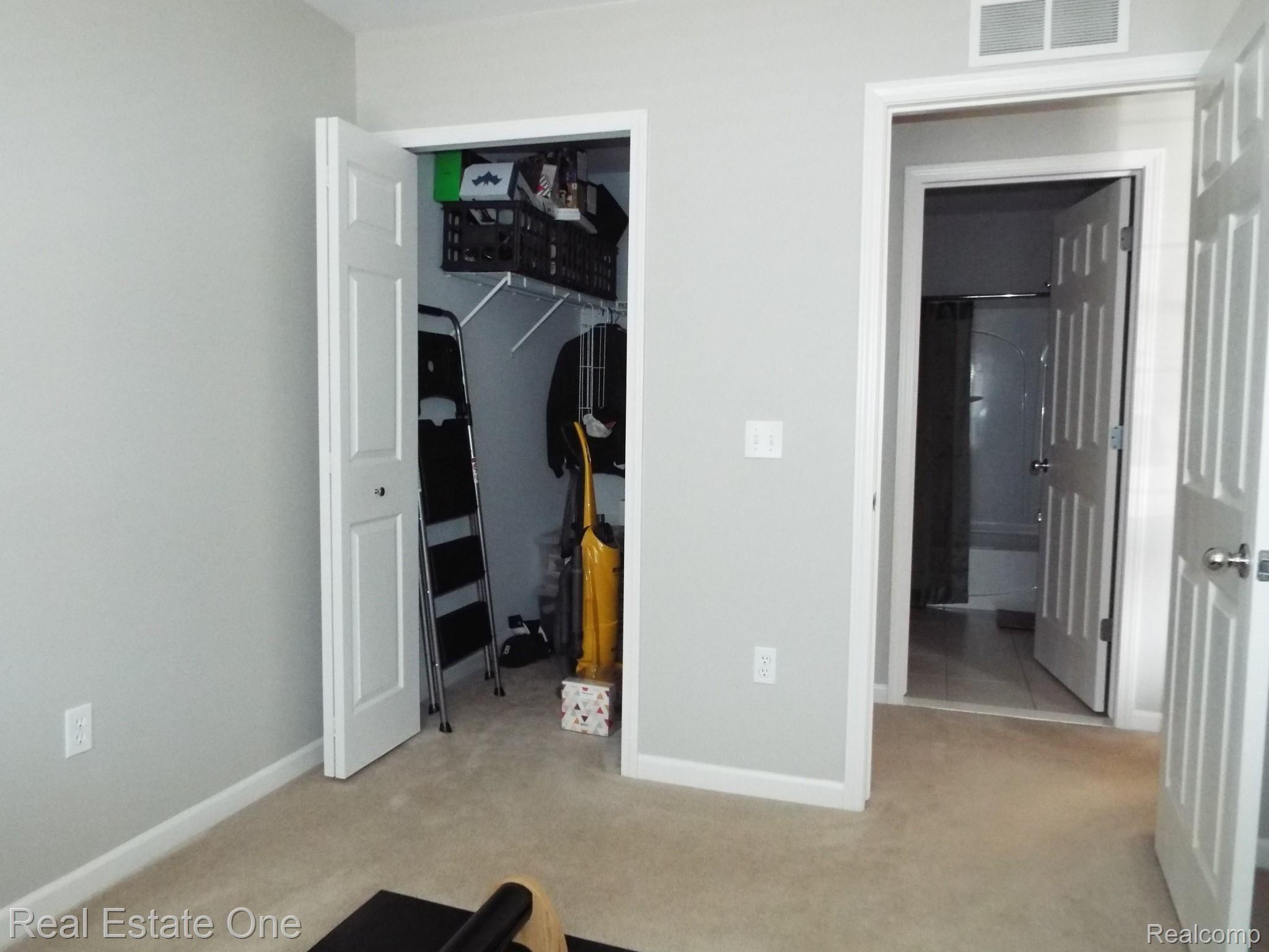 234 North Wixom Road Wixom, MI 48393 - Photo 19 of 33 bed 2 closet.JPG